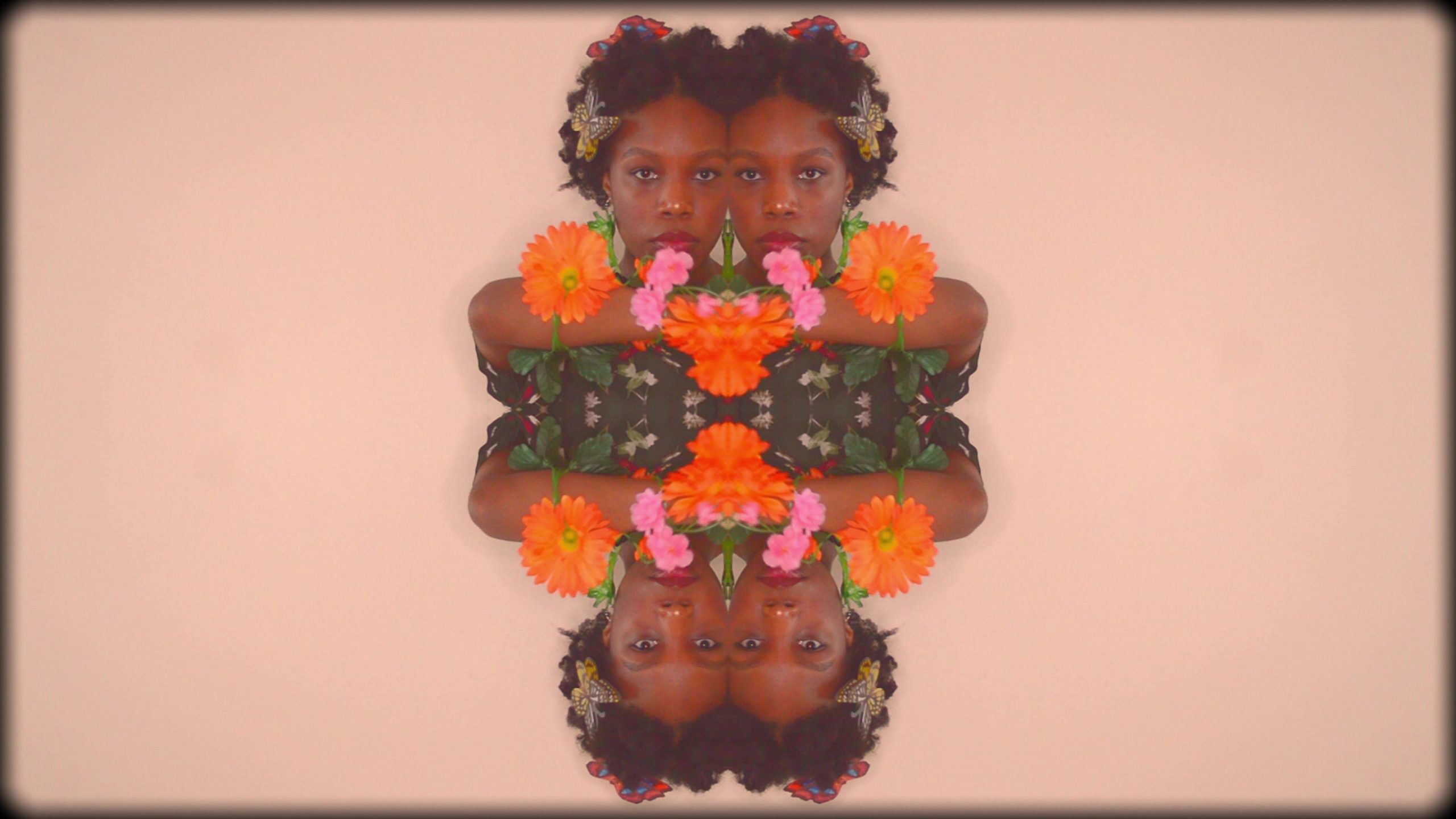 A kaleidoscopic portrait depicting a Black woman with butterflies in her hair and flowers in her clothes gazing directly at the viewer.