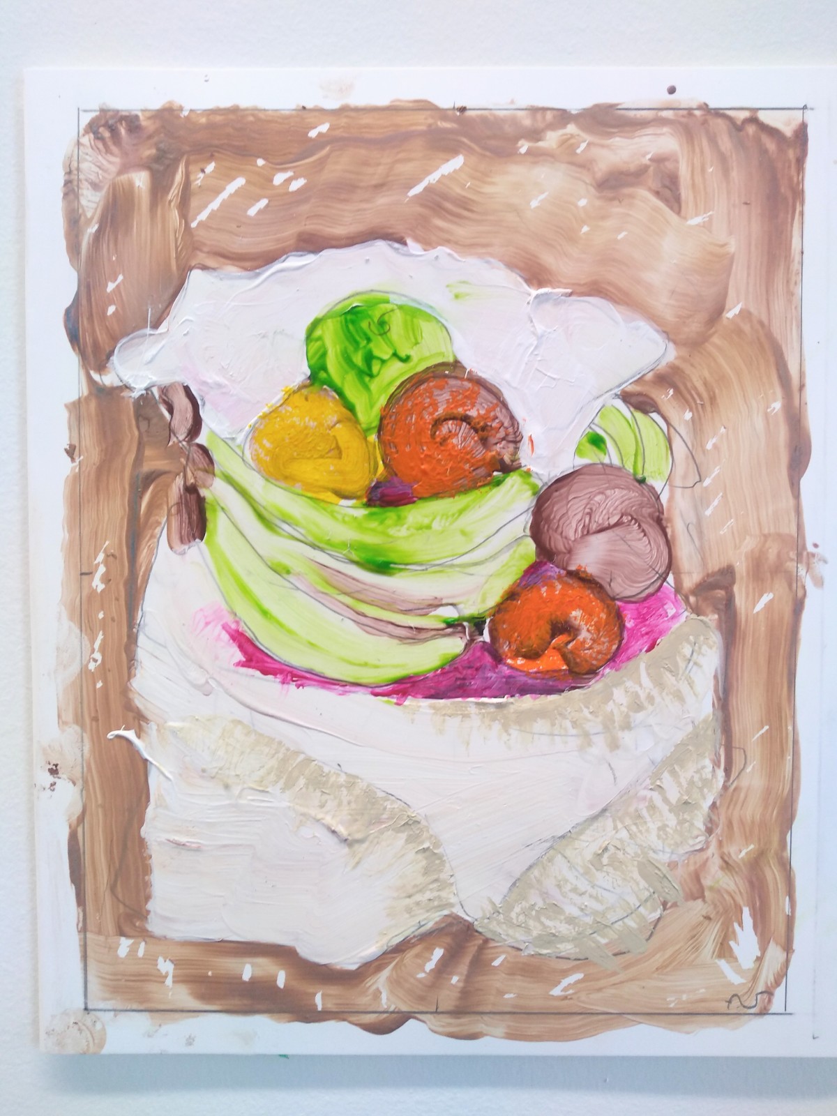 Bowl of fruit with brown border.