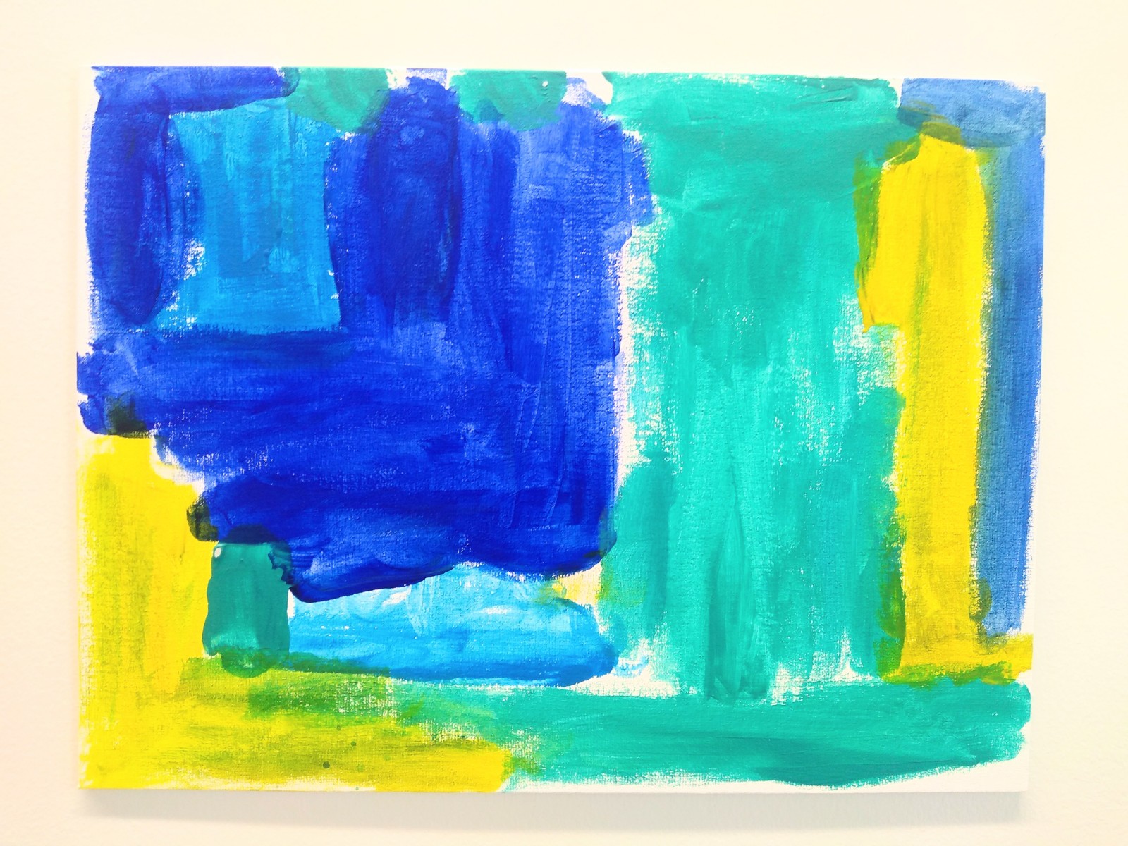 Abstract squares and rectangles of blue, yellow and teal.
