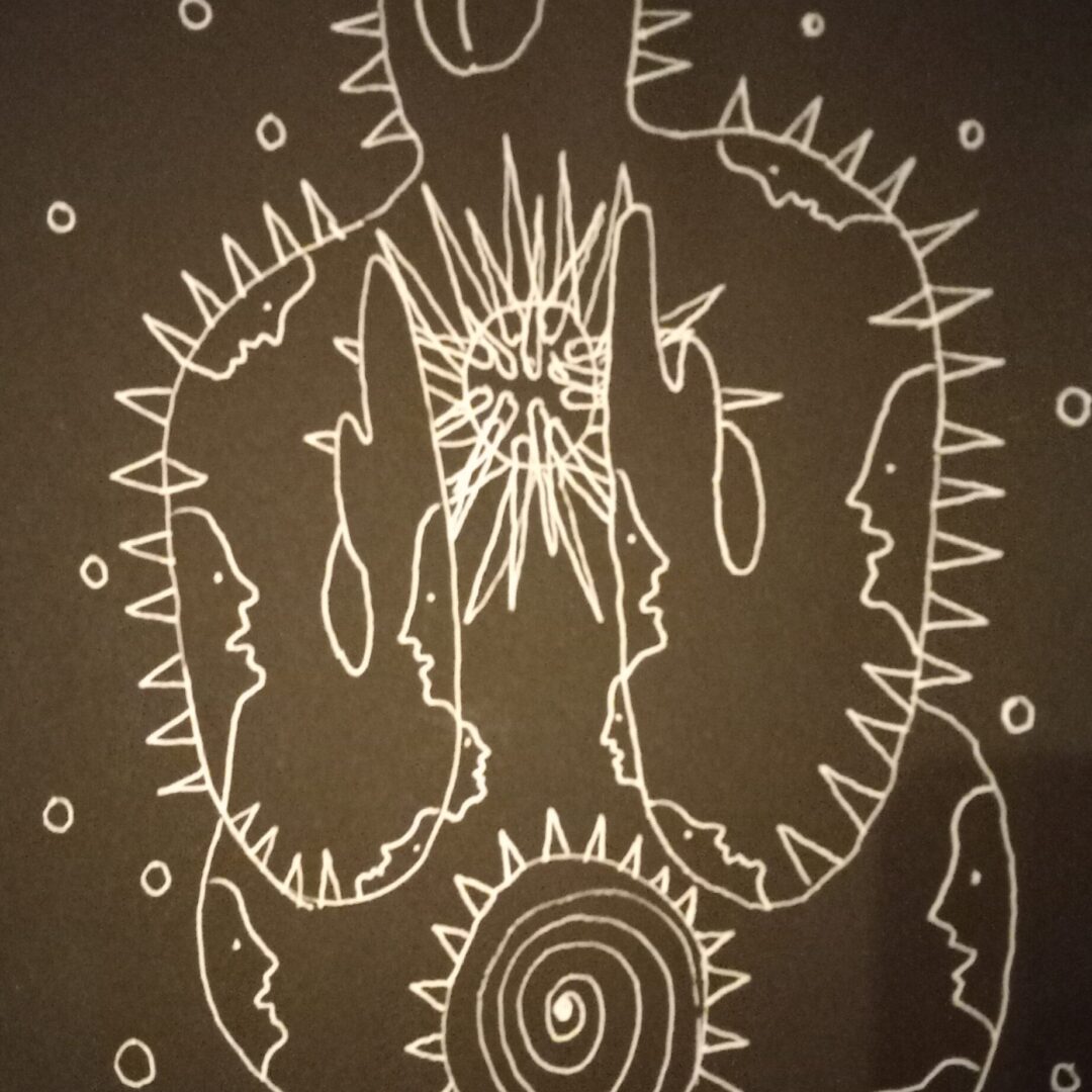 White on black line drawing of a human figure with faces on its body and a tongue sticking out in places of eyes.