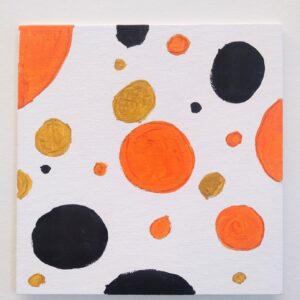 Black and orange circles spread out on white background.