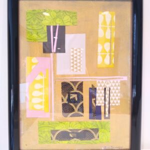 Yellow, black and green patterned paper cut out collages in black frame.