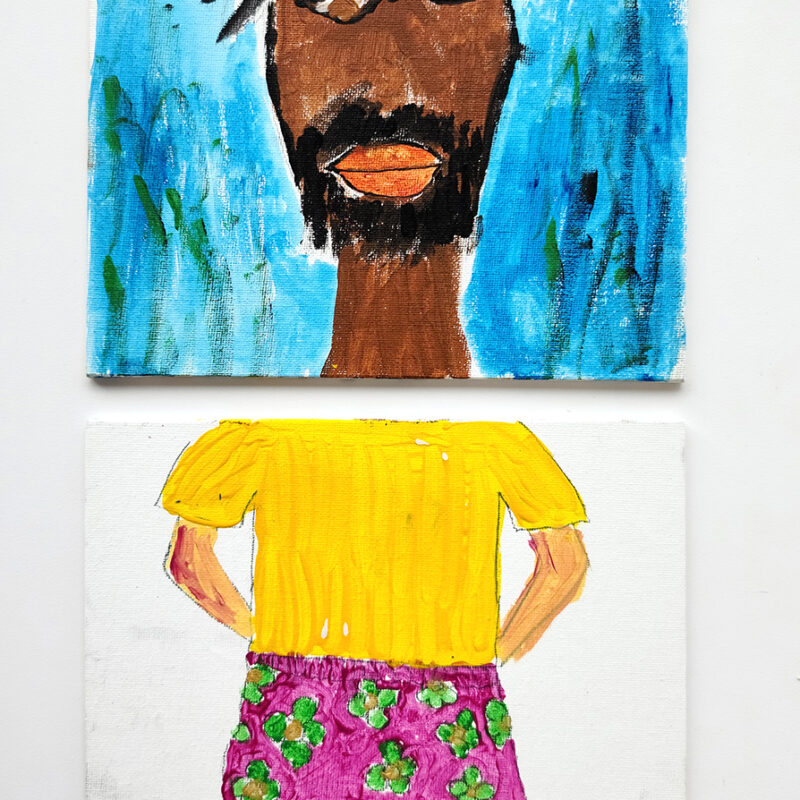Painting of human figure divided into two canvases. Top canvas has painting of a face in brown with black hair and beard on a blue background, bottom canvas has the body with a yellow t-shirt, purple skirt with green flowers, pink legs and black shoes.