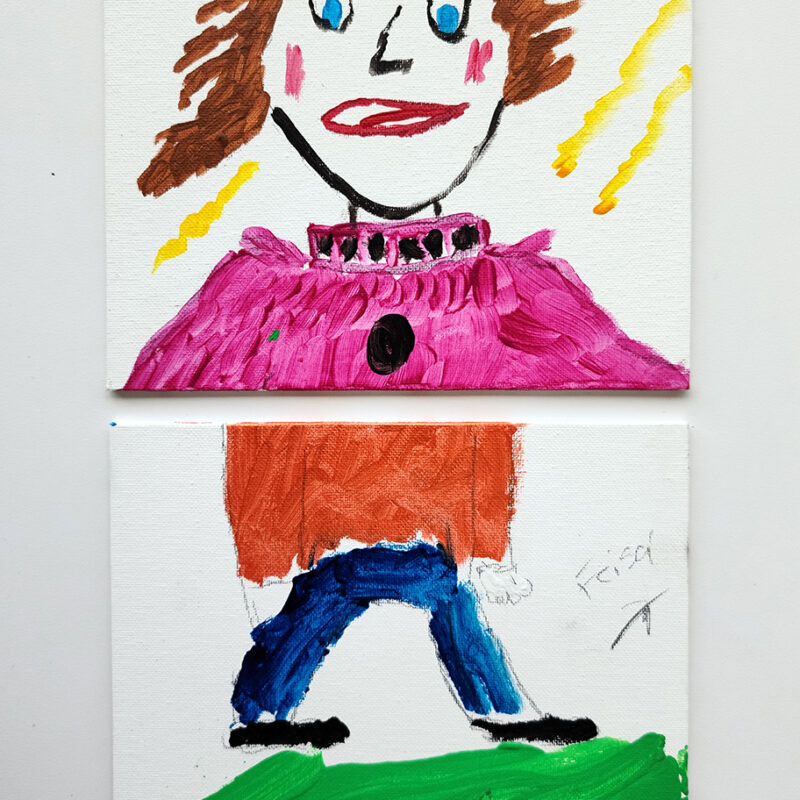 Painting of human figure divided into two canvases. Top canvas has painting of a face with pink blush, brown hair and a pink top with black buttons. Bottom canvas has the body with a red shirt, blue pants and black shoes walking on green.